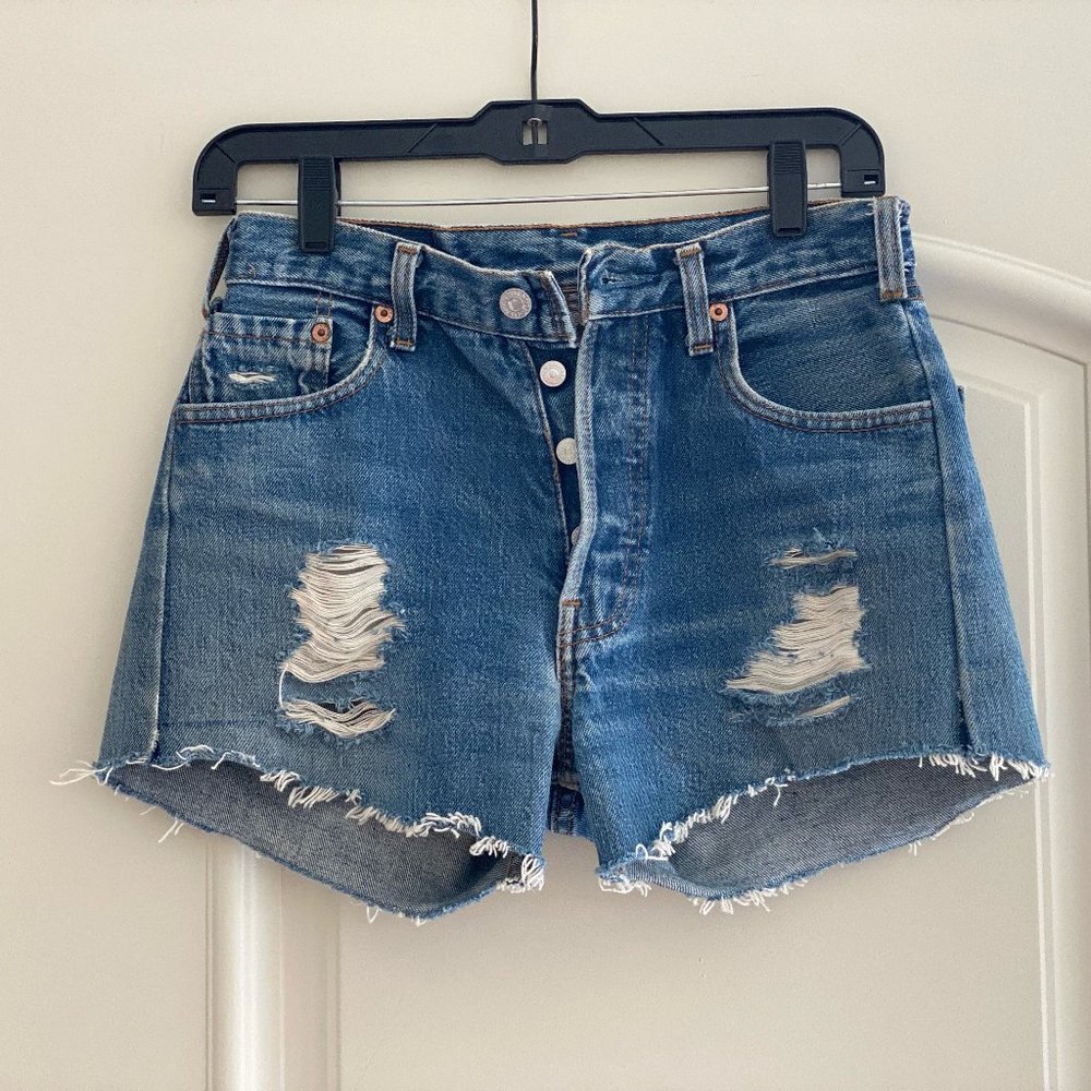 Vintage High Waist Levi's distressed shorts